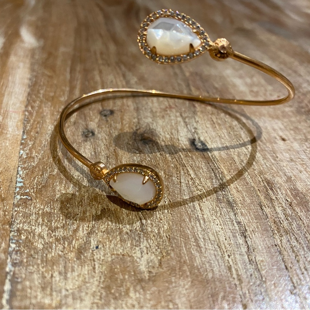 Gold colored bangle bracelet